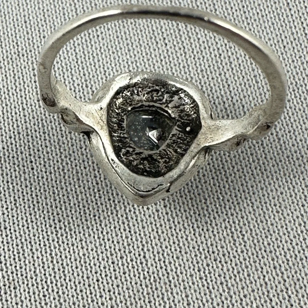 Silver tone ring with a clear teardrop shaped crystal center. - Picture 4 of 4